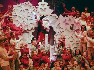 Every year Santa arrives in a different way. This particular year he flew in on a giant snowflake.