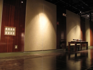 To "dress up" bare walls in an undeveloped section of the museum, AST Exhibits built and installed large decorative panels of fabric and bamboo plywood.