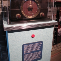 Thanks to AST Exhibits, visitors to the museum can travel back in time by pushing a button and experience actual Hurricane Donna broadcasts streaming from a vintage radio.