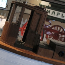 A view of the restored Naples welcome wagon from the deck of a miniature model.