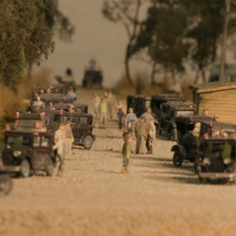 HO scaled townsfolk gather with excitement anticipating the arrival of the first passenger train to Naples in this model created by AST Exhibits.