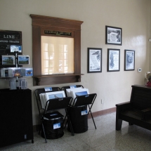 Guests have been known to tap on the glass of the ticket window in hopes an attendant will open the shade and answer a question or two. The "window" is actually an effect built by AST Exhibits and the only thing behind it is a plaster wall.