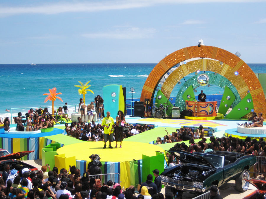 This versatile stage built by AST had to accommodate a hot tub, multiple live performances, a dj booth, an interview couch, modeling runways and even a car show.