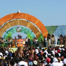 Show time on the beach. Cameras roll as the stage comes to life.