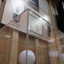 This simple interactive display shows the power that can be saved by using fluorescent light bulbs.